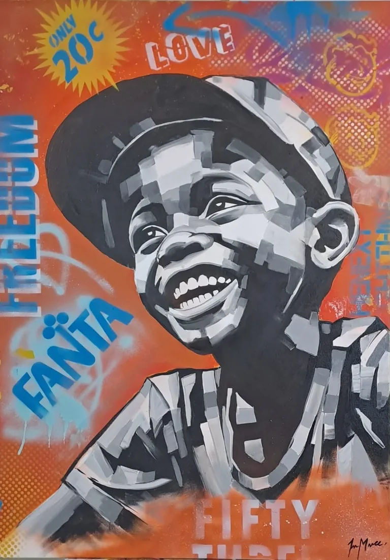 Smiling child in a cap against an orange collage